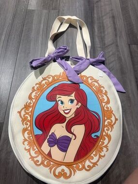 Oval Canvas Tote Bag with Purple Accents and Ariel Artwork